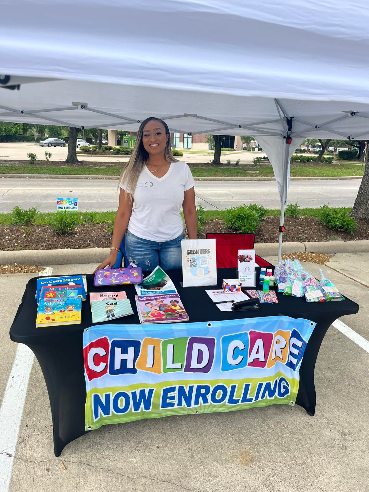 Ms. Chelsey at a community Child Care Now Enrolling event
